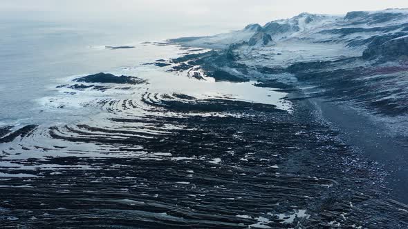 Cold sea and rocky shore in polar climate. Aerial view.
