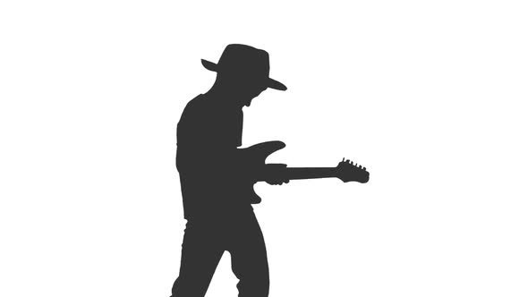 Silhouette of Little Boy Playing Guitar 