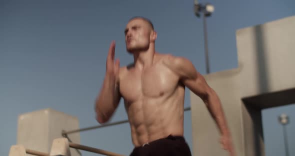 Sweaty Sportsman Running on Spot alt