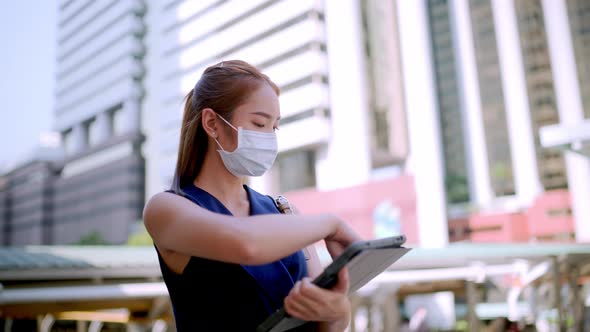 Office Girl in the city (Bangkok), wear a mask