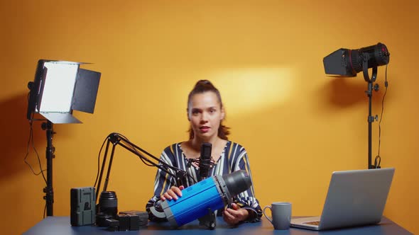 Content Creator Doing Review of Professional Studio Light alt