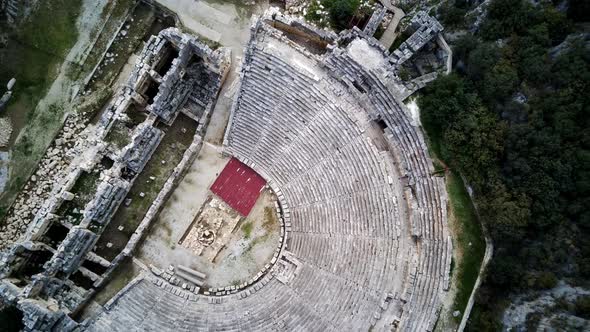 High angle drone aerial view of ancient greek lykian empire amphitheatre in Myra (Demre, Turkey) alt
