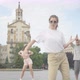 Camera Approaches To Cheerful Young Girl Dancing Robot Dance on Sunny City Square with Group of - VideoHive Item for Sale