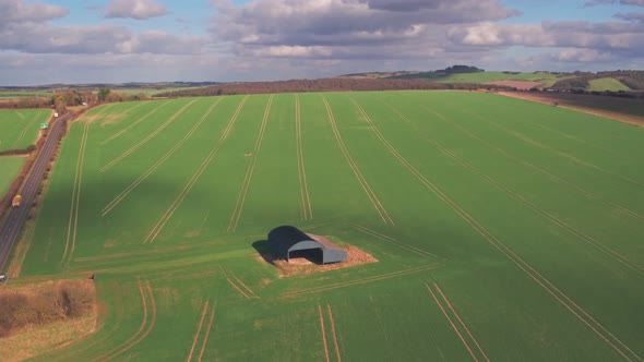 Rural farming countryside in Dorset, England. Aerial drone view alt