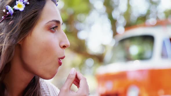 Couple having berries at music festival alt