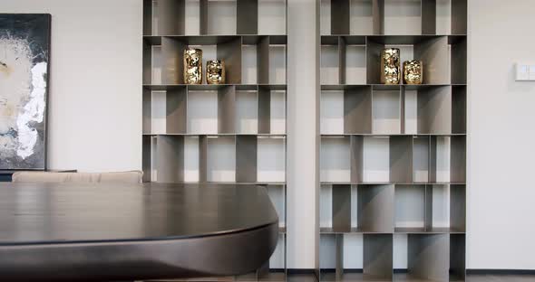 Minimalist brown shelf. Modern Furniture and cozy design.Home modern black shelf alt