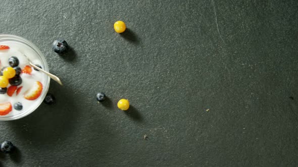 Blueberries and strawberries with milk in bowl 4k alt