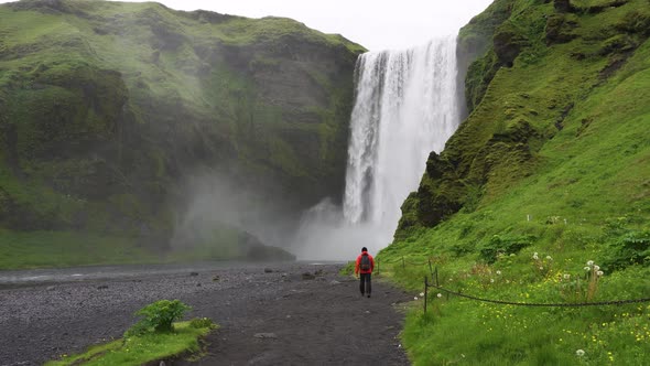 Tourist Walks To the Skogafoss Waterfall in Southern Iceland alt