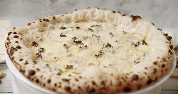 Big Pizza with 4 Cheese with Pear Ready for Eating Delicious Italian Pizza alt