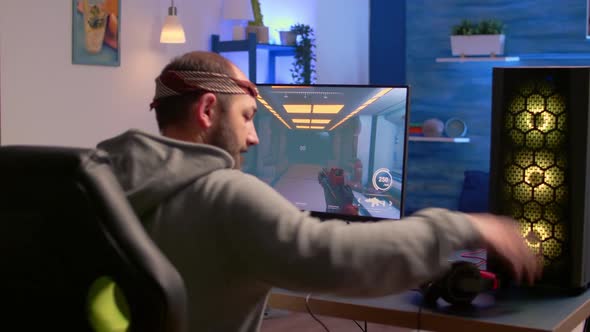 Addicted Video Gamer Performing Cyber Video Games alt