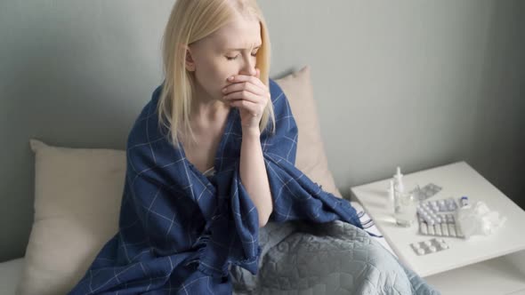 the Girl is Sick with a Cold Viral Disease Coronavirus alt