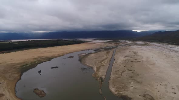 Aerial views over the very dry Theewaterskloof dam in the drought stricken western cape of south afr alt