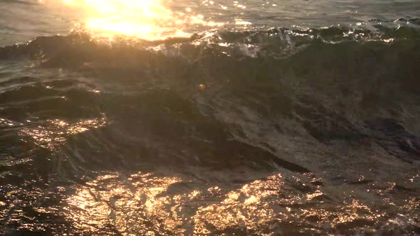 Sunset waves in a lake in a silver lake. Shot with Sony a6400 alt