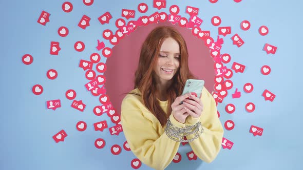 Woman with Red Hair Who Has No Other Interests Than a Smartphone She Can Not Live Without the alt