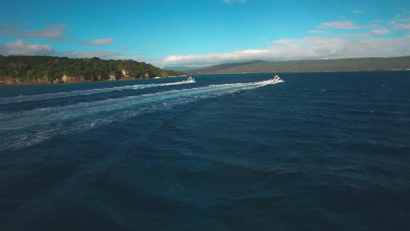 Seascape of Tropical Sea and Two Speedboats Sailing Fast Offcoast, Drone Aerial View alt