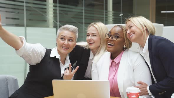 Diverse Business Women Taking Selfie on Smartphone Laugh alt