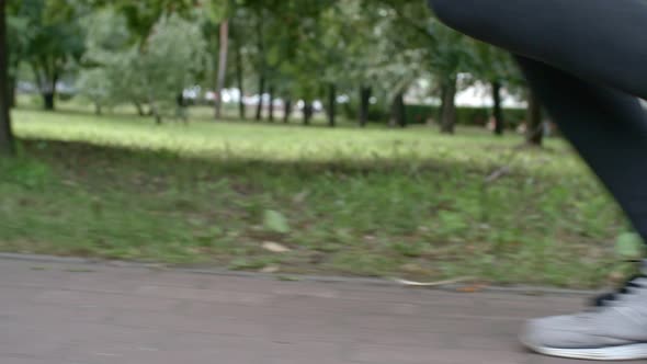 Close Up of Feet of Running Woman alt