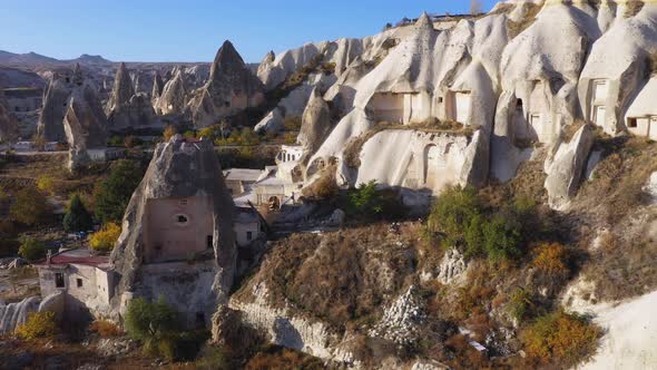 Cave Town and Rock Formations at Goreme, Cappadocia, Turkey. alt