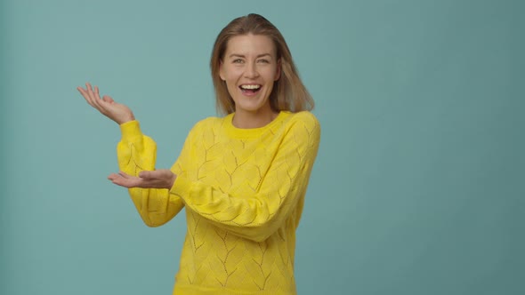 Happy Woman in Yellow Gesturing