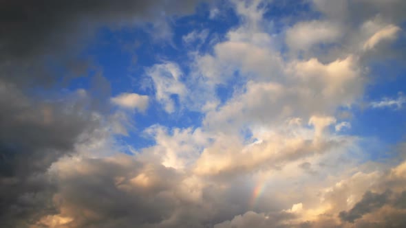 Time-lapse of clouds and blue sky alt