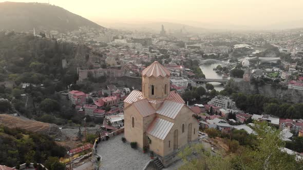 Georgian Orthodox Church with the Tbilisi Cityscape at Background Georgia alt
