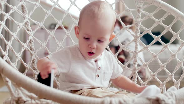 Baby Boy Playing on Smartphone