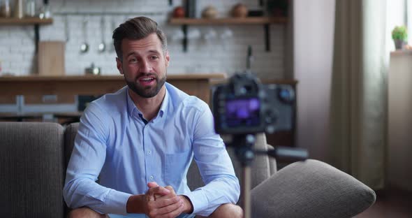 Happy Businessman or Blogger with Camera Recording Video Blogging Technology Videoblog Mass Media alt