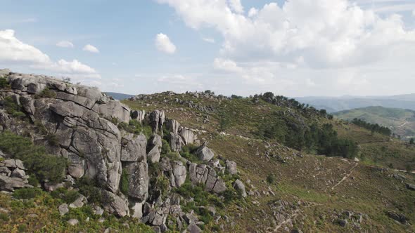 Aerial forward view of ridge of mountain in extensive horizon. National Park Geres. Portugal