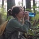 Ethnic Female Drinking Water In Forest - VideoHive Item for Sale