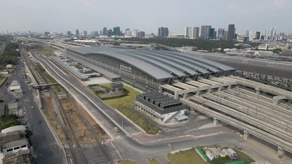 Aerial Pullback from Thailand's new railway hub, Bang Sue Grand Station in Bangkok alt