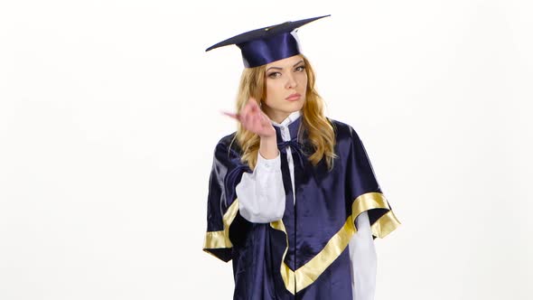 Female Graduate Threatening Finger and Shows Sign Quietly. White alt