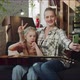 Mom and Child Take Funny Selfies with a Guitar and Look at the Photo - VideoHive Item for Sale