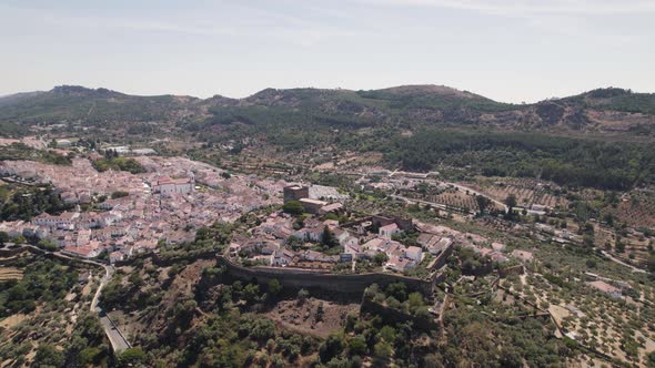 Castelo de Vide fortress and surrounding landscape, Portugal. Aerial descendent alt