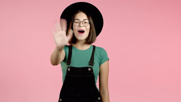 Young Mixed Race Friendly Woman Waving Hand - Hello. Greeting, Say Hi To Camera. Beautiful Young alt