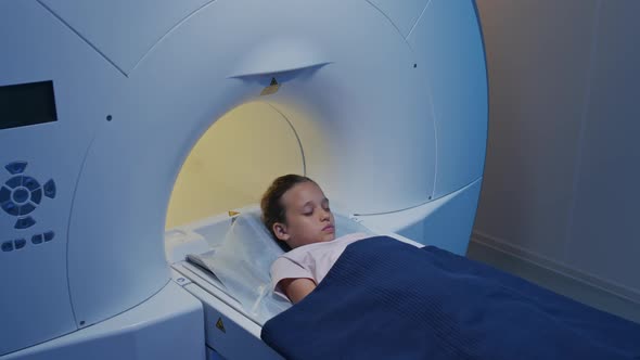 Girl Getting Inside MRI Tube for Examination, Stock Footage | VideoHive