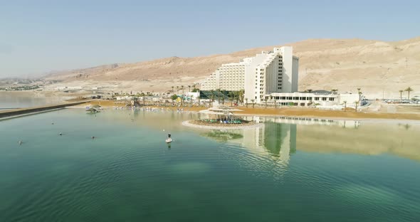 Aerial view of a man on  a sap, The Dead sea, Negev, Israel. alt