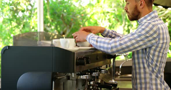 Portrait of smiling male owner alt