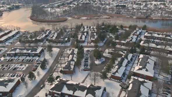 Snowy Winter on the Residential Streets After the Snow of a Small Apartment Complex Town alt