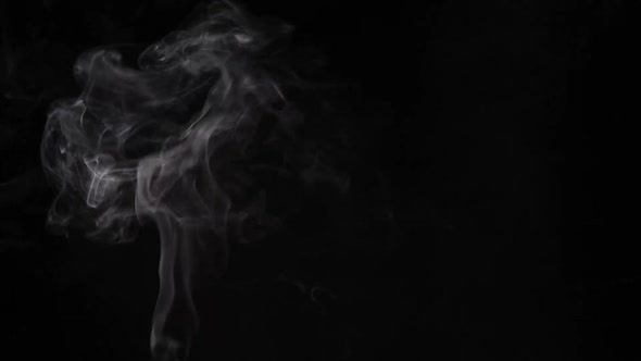 Soft Fog in Slow Motion on Dark Backdrop. Realistic Atmospheric White Smoke. 50 FPS alt