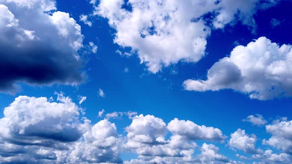 Timelapse, White, Beautiful Airy Clouds Are Running Against the Blue Sky. alt