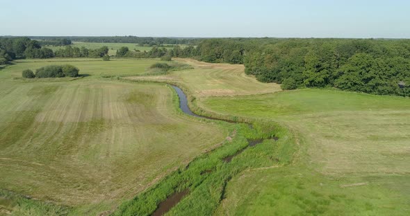Aerial view of small winding river Reest. alt