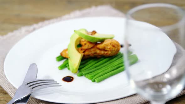 Chopped vegetables decorated on plate with wine alt