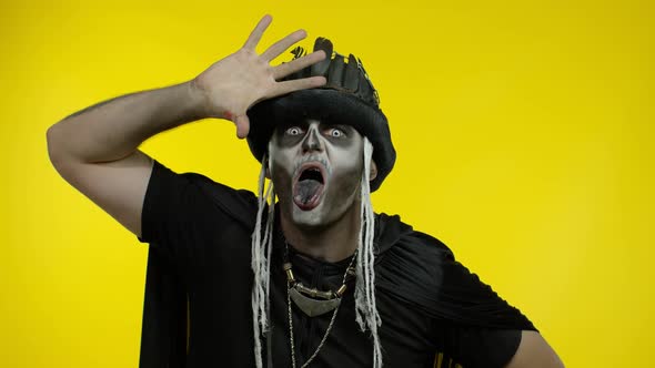 Frightening Man in Skeleton Halloween Makeup Making Angry Faces, Shaking Head, Showing Tongue alt
