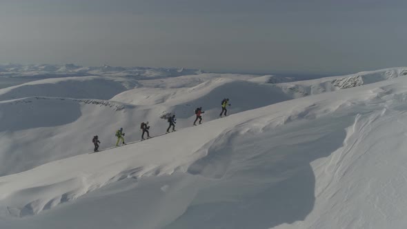 Caravan Of Skiers On Mountain Ridge - 4K