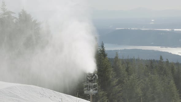 View of Top of Grouse Mountain Ski Resort with the City in the Background alt