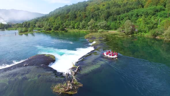 Aerial view of rafters going down a waterfall on Una river in Bosnia alt