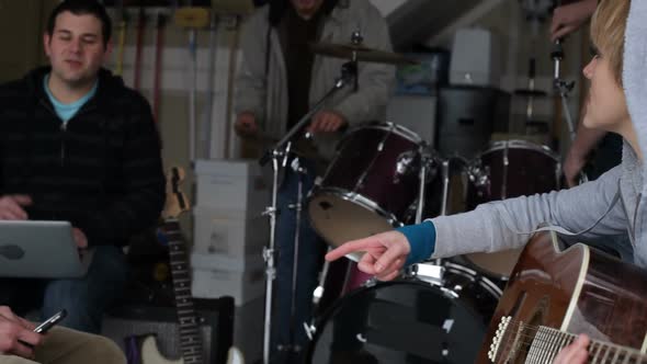 Woman plays guitar alt