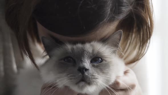 Woman shooting a video of her cute cat