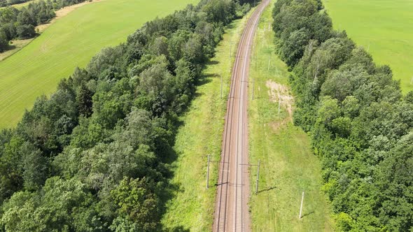 Train Way Through green grassed countryside, Aerial