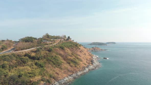 Windmill Viewpoint over Steep hill carrying the road to Promphet Cape, in Phuket, Thailand  alt